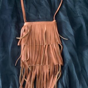 Cross board purse with fringes